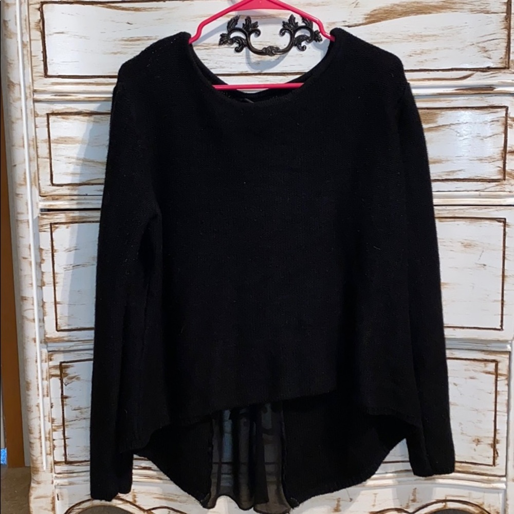Women’s high low sweater with zipper back detail